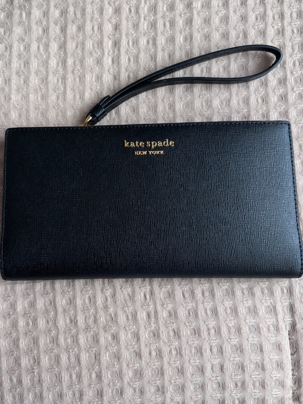 kate spade black leather wristlet clutch with gold logo hardware